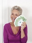 Senior Woman Holding Money
