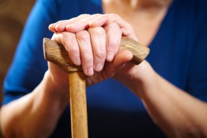 34101529 - old woman hands with cane. senior people health care.